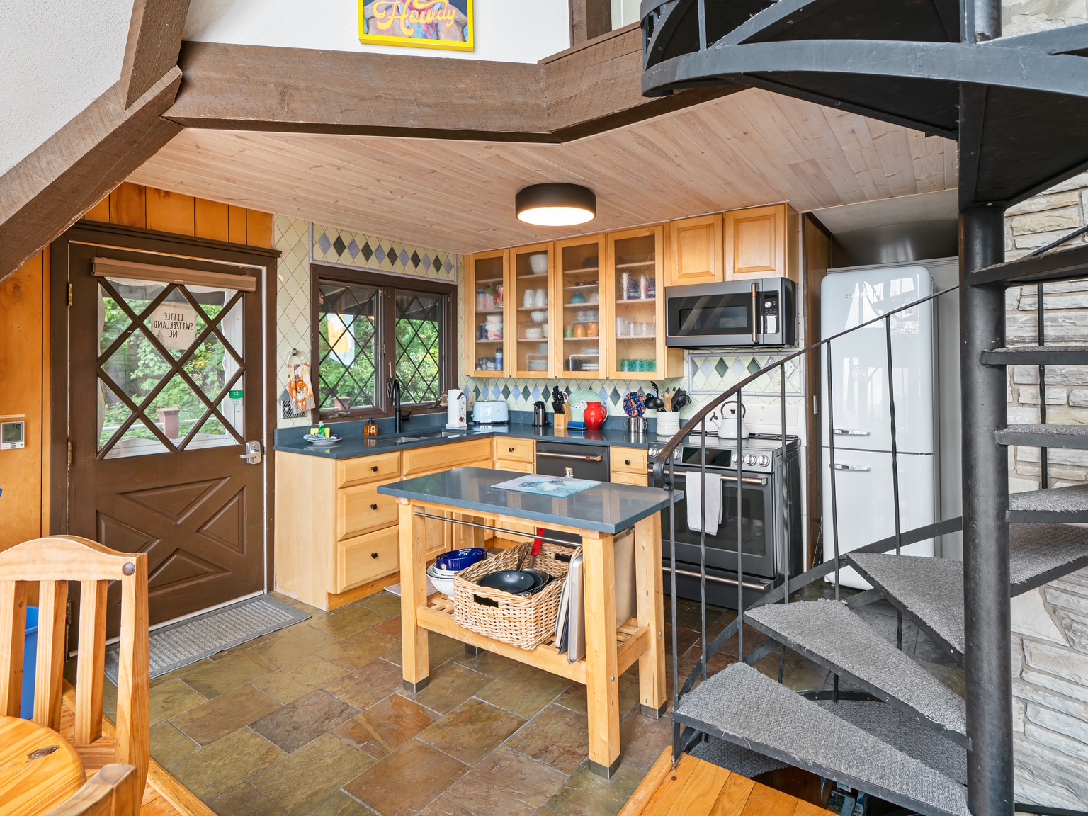 Charming kitchen with spiral staircase